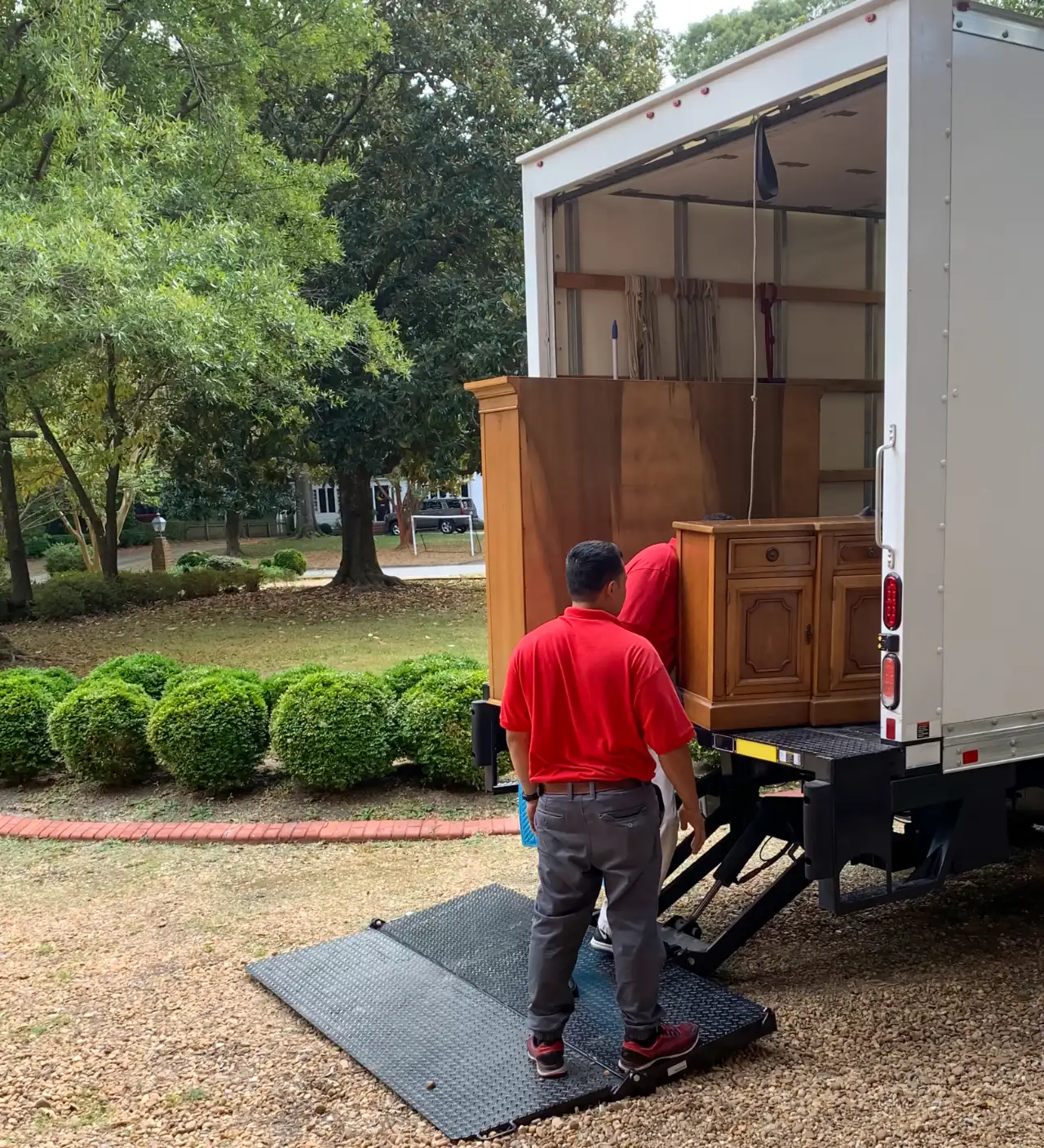 Crew loading items during a garage cleanout